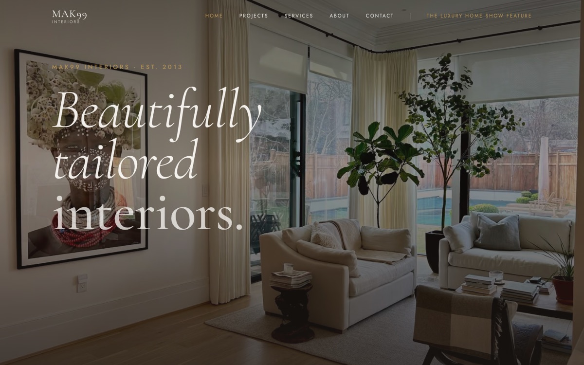 MAK99 Interiors landing page: "Beautifully tailored interiors." set in italic serif over a sunlit living room